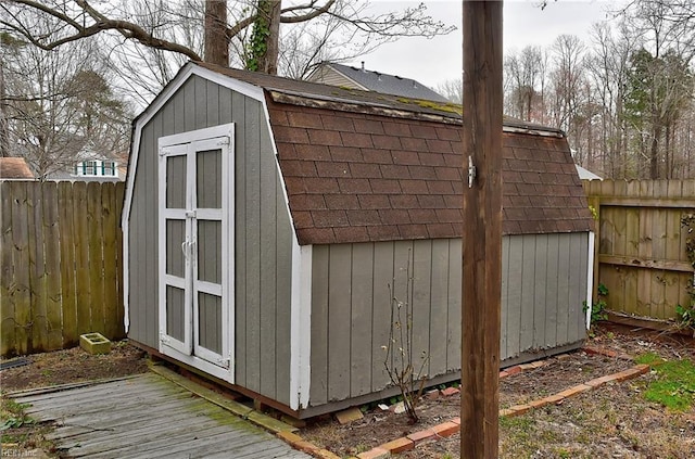 view of shed featuring a fenced backyard