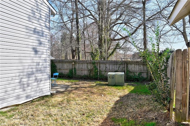 view of yard featuring a fenced backyard