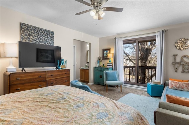 bedroom with ceiling fan, a textured ceiling, and carpet