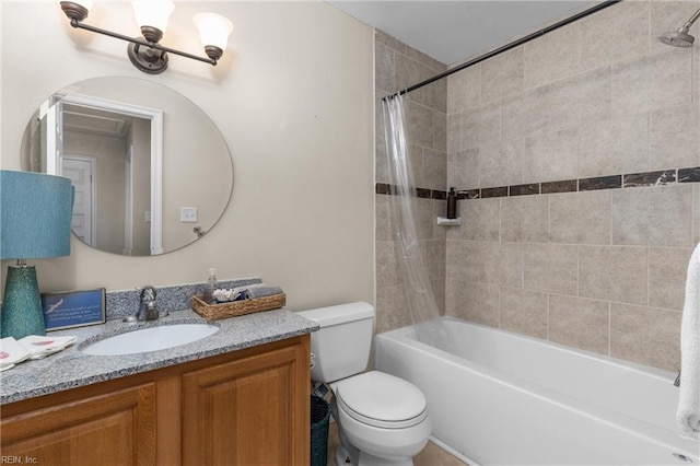 bathroom featuring toilet, shower / bath combo, and vanity