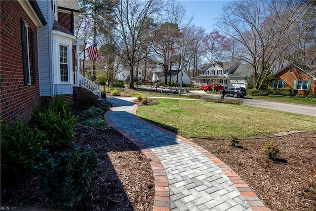 view of yard featuring a residential view