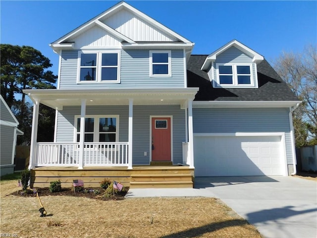 view of front facade featuring board and batten siding, a shingled roof, a porch, concrete driveway, and a garage