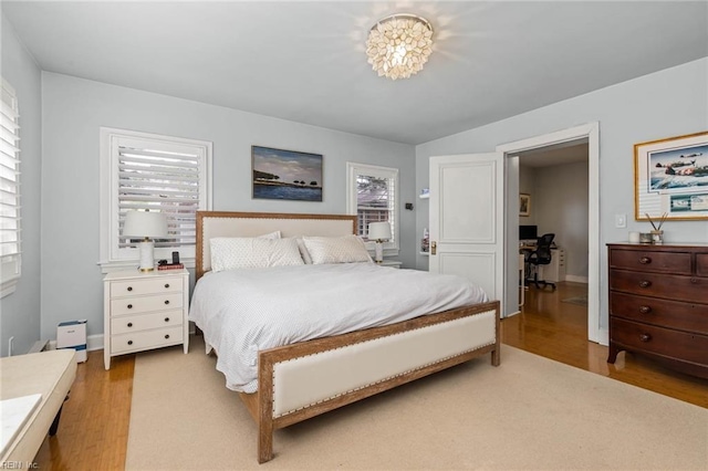 bedroom featuring light wood-style floors