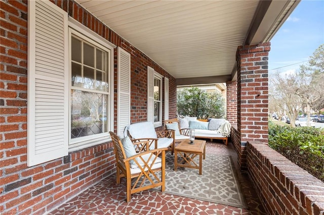 view of patio featuring covered porch and an outdoor hangout area