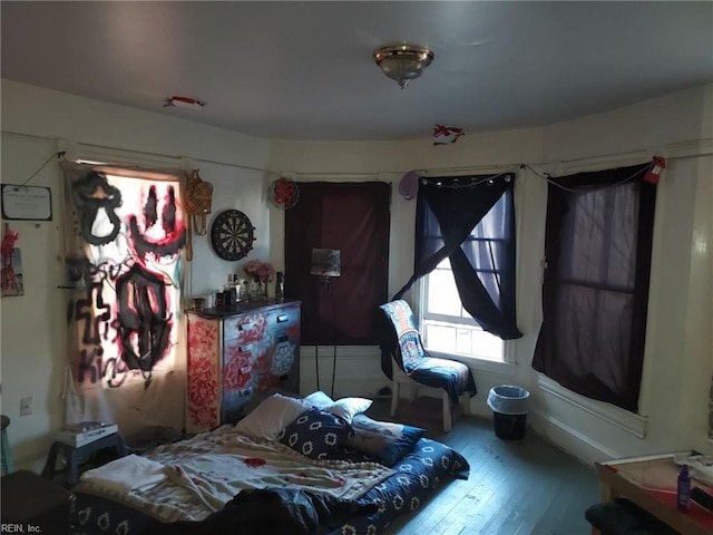 bedroom featuring hardwood / wood-style flooring