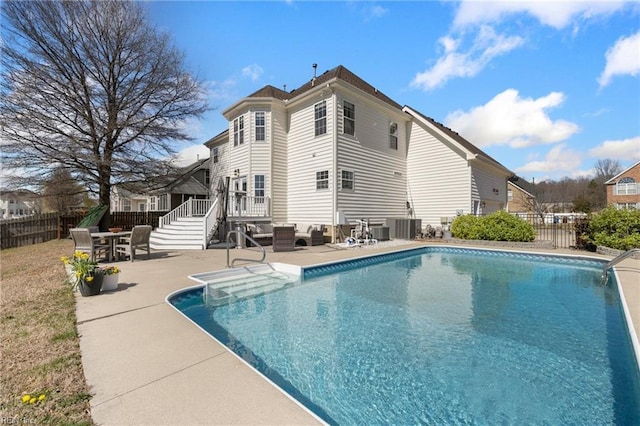 view of pool featuring a fenced in pool, outdoor dining area, a patio, and fence