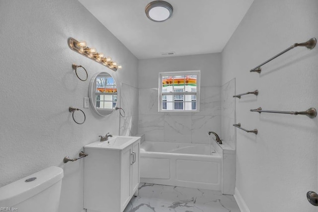 full bath with vanity, a bath, visible vents, toilet, and marble finish floor