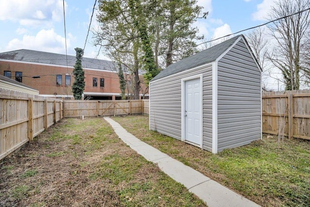 view of shed featuring a fenced backyard