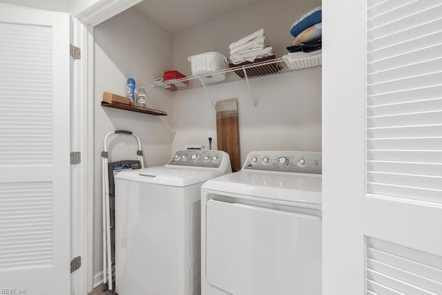 washroom with laundry area and separate washer and dryer