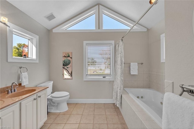 bathroom featuring toilet, lofted ceiling, tile patterned flooring, baseboards, and vanity