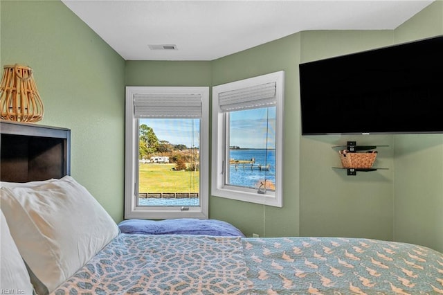 bedroom featuring visible vents