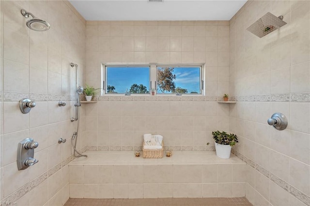 bathroom featuring a tile shower