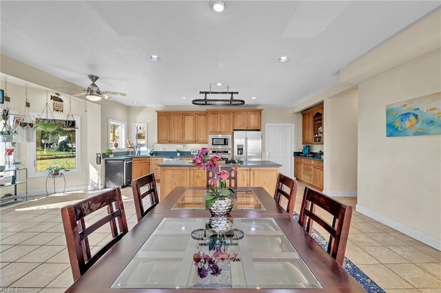 dining area with light tile patterned floors, recessed lighting, baseboards, and ceiling fan