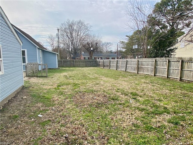 view of yard featuring a fenced backyard