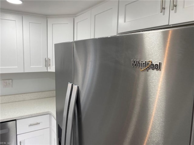 kitchen featuring white cabinets and stainless steel appliances