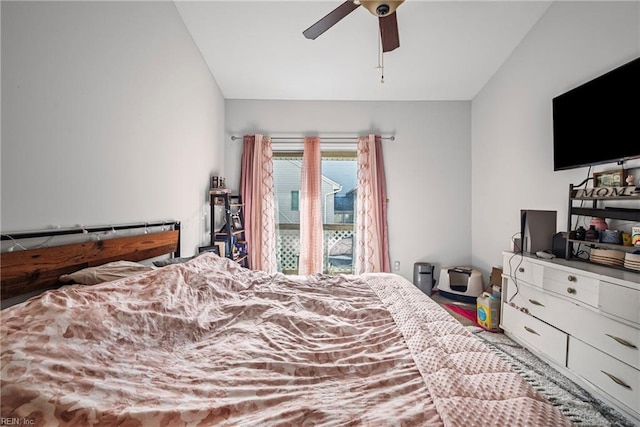 bedroom featuring vaulted ceiling and ceiling fan