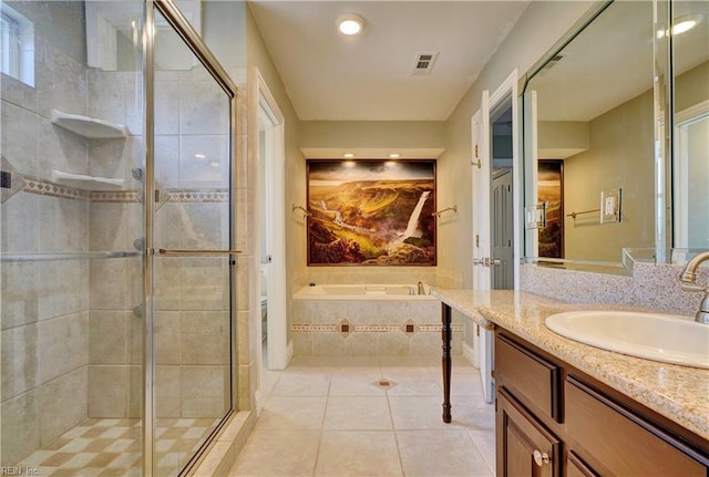 bathroom with vanity, visible vents, a stall shower, tile patterned flooring, and a bath