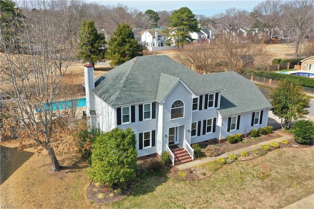 view of front of property with crawl space and a front yard