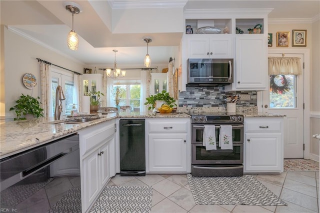 kitchen with a sink, stainless steel appliances, ornamental molding, and white cabinets