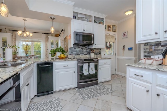 kitchen with stainless steel appliances, white cabinets, crown molding, and hanging light fixtures