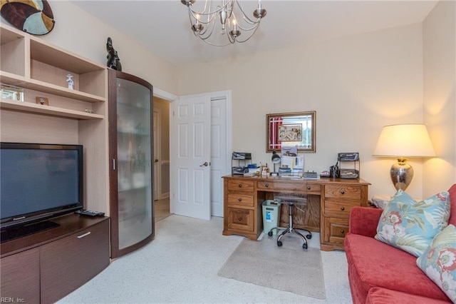 office area with an inviting chandelier and light carpet