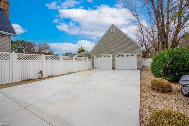 garage with fence