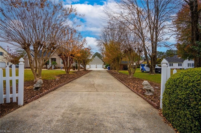 exterior space featuring a residential view and driveway