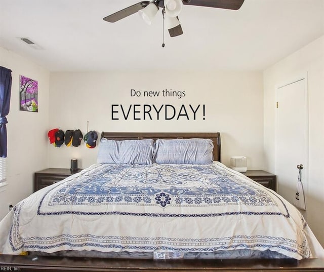 bedroom with visible vents and ceiling fan