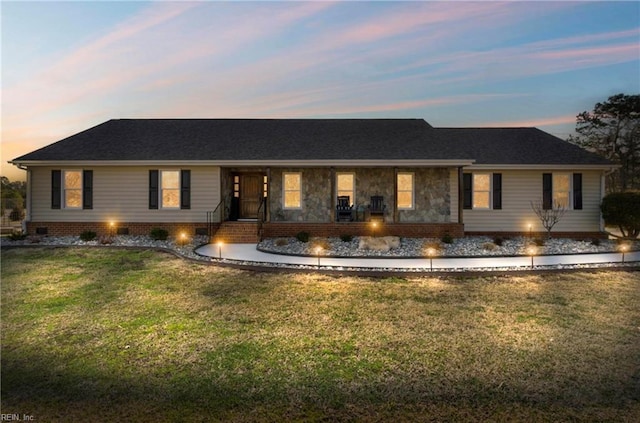 ranch-style house with crawl space and a front lawn