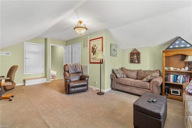 carpeted living area with visible vents, lofted ceiling, and baseboards