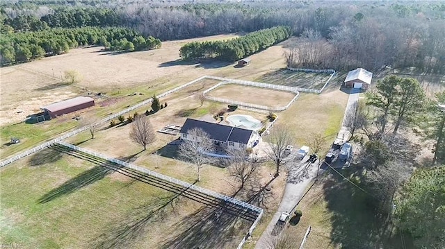 birds eye view of property featuring a rural view