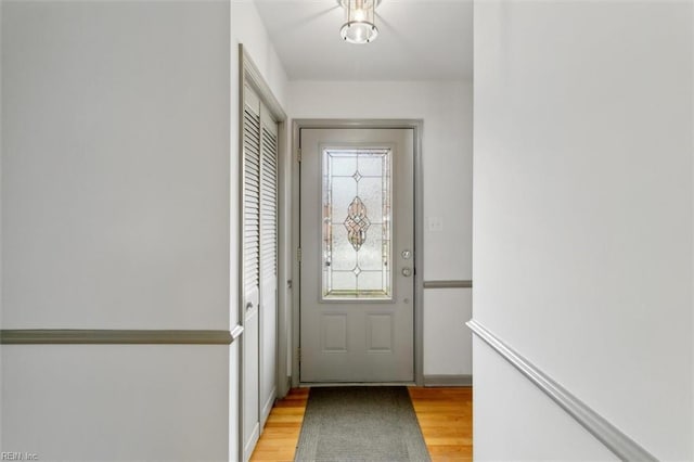 doorway to outside featuring light wood-style floors