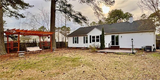 back of house featuring fence private yard, central AC unit, a chimney, crawl space, and a pergola