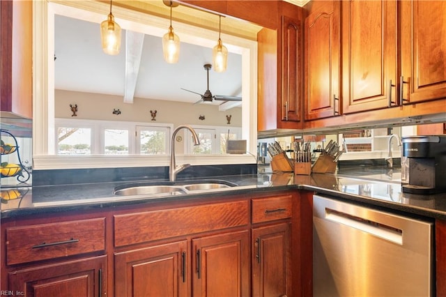 kitchen featuring dark countertops, beamed ceiling, pendant lighting, stainless steel dishwasher, and a sink