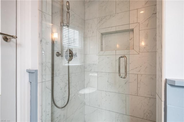 full bathroom featuring a shower stall