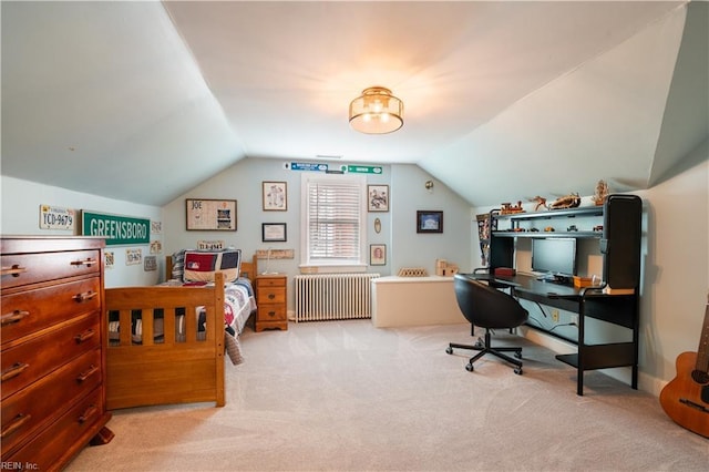 bedroom with lofted ceiling, radiator, and light carpet