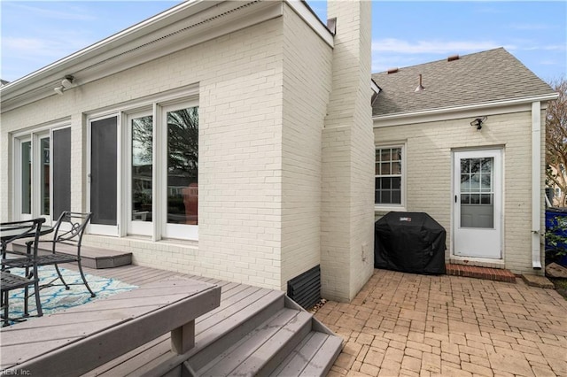 exterior space featuring a patio area and grilling area