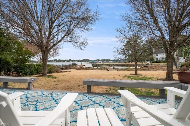 view of patio featuring a water view