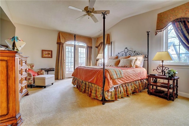 bedroom with access to exterior, a ceiling fan, lofted ceiling, and carpet floors