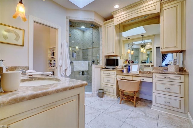 full bath featuring tile patterned floors, recessed lighting, a stall shower, and vanity