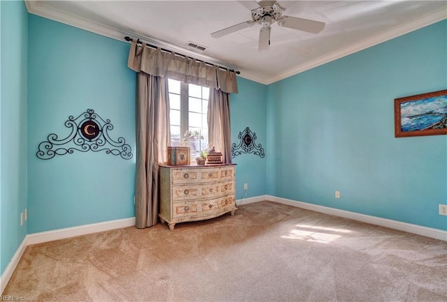 bedroom with baseboards, visible vents, carpet floors, and ornamental molding