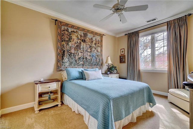 bedroom with a ceiling fan, visible vents, baseboards, ornamental molding, and light colored carpet