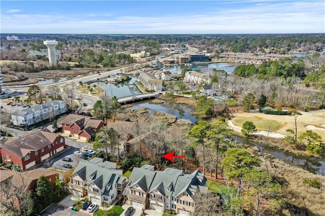 aerial view with a water view and a residential view