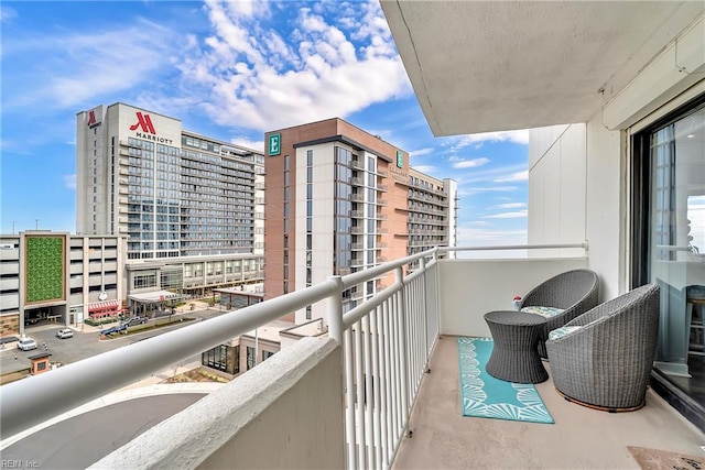 balcony featuring a city view