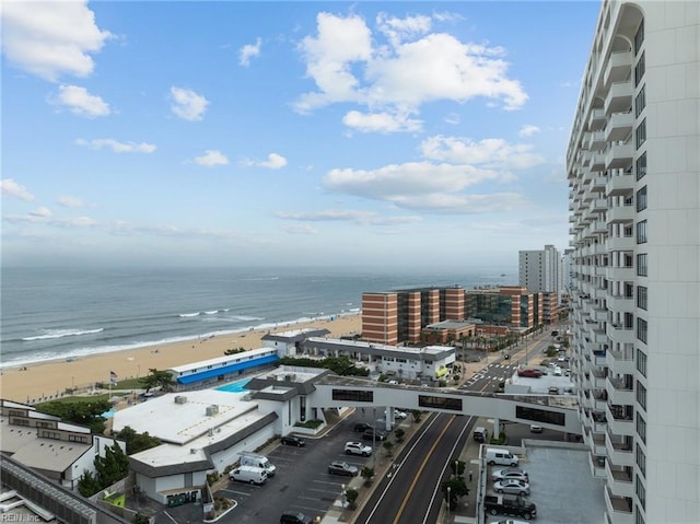 exterior space featuring a view of the beach and a view of city