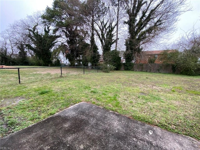 view of yard featuring fence