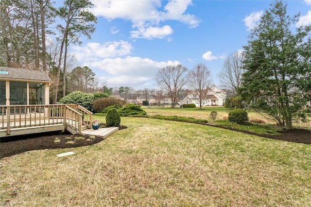 view of yard featuring a deck