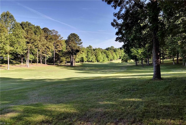 surrounding community featuring a lawn