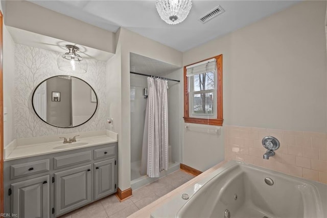 bathroom featuring visible vents, a tub with jets, a stall shower, and vanity