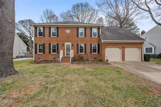 colonial house featuring crawl space, driveway, brick siding, and a garage